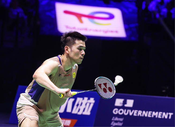 A man is playing tennis, holding a racket and preparing to hit a tennis ball. AI generated content