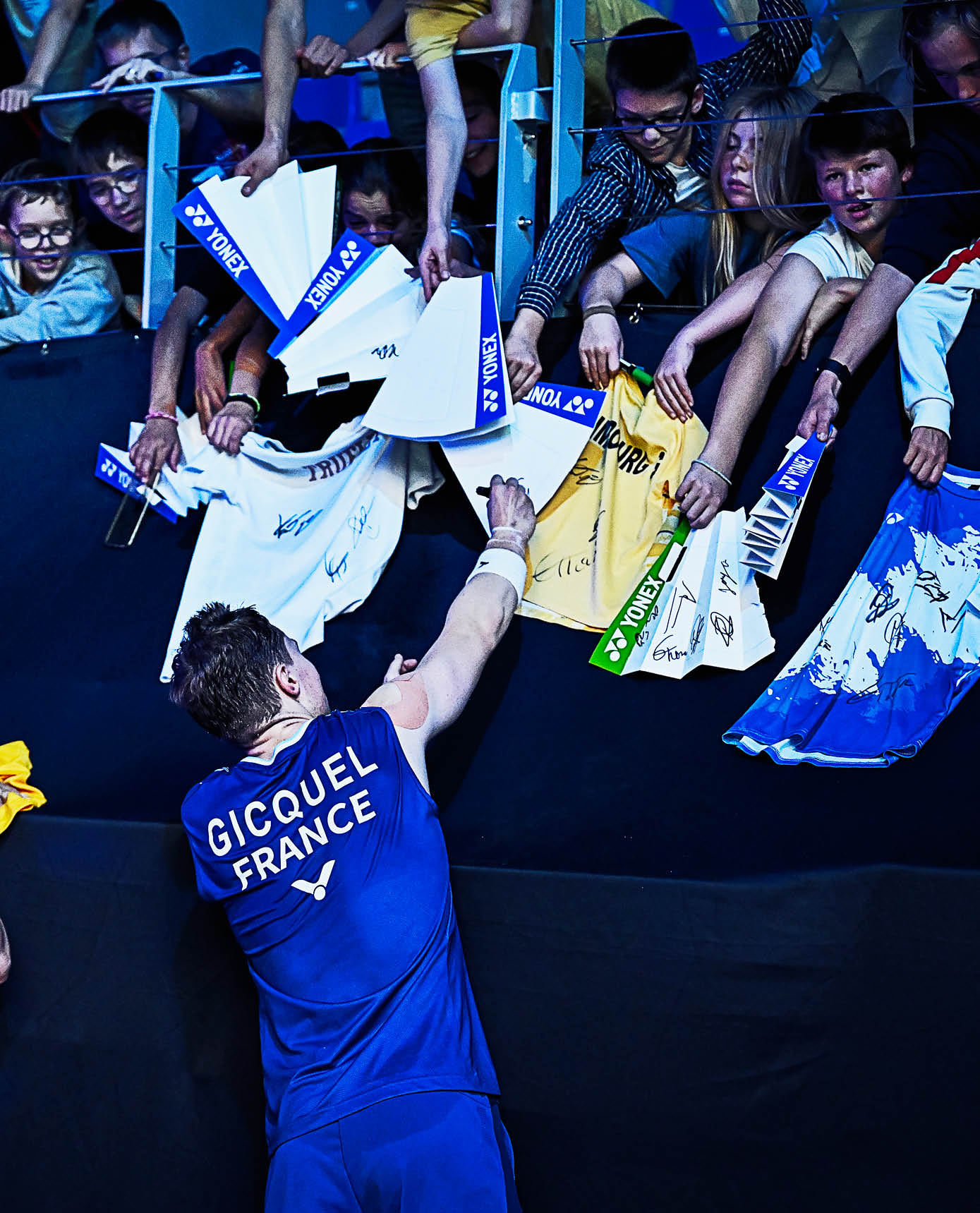 Two men are handing out bananas to a crowd of people. AI generated content