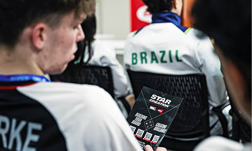 A man is holding a magazine with the word Star on it. AI generated content