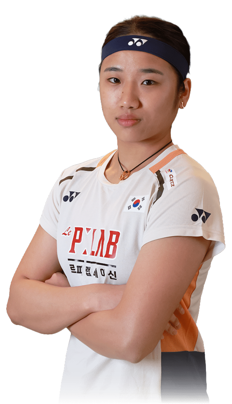 A woman wearing a white shirt with a red stripe and a headband. AI generated content