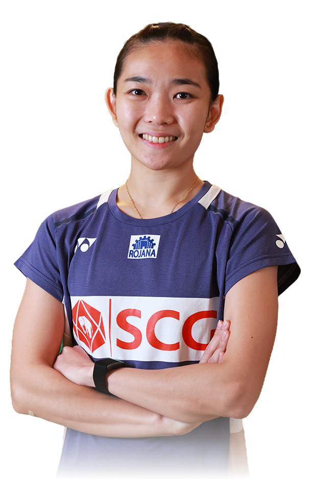 A woman wearing a blue shirt with a white logo poses for a picture. AI generated content