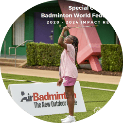 A man and a woman are playing tennis on a court. The woman is holding a tennis racket and the man is holding his hands up. AI generated content