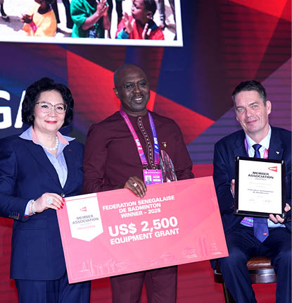 Three people are standing on a stage, holding up awards. One of the men is holding a check for $2,500. AI generated content