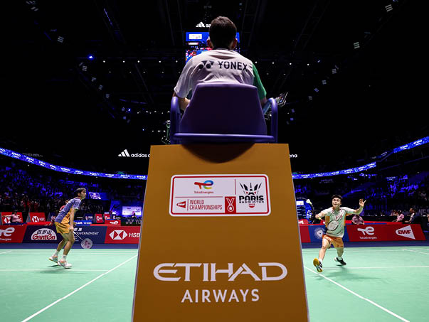 Three men playing tennis in a stadium. AI generated content